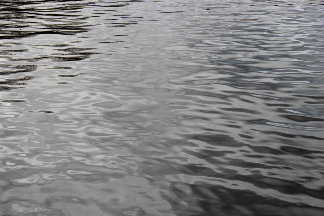 Closeup of river Spree and it's glossy water